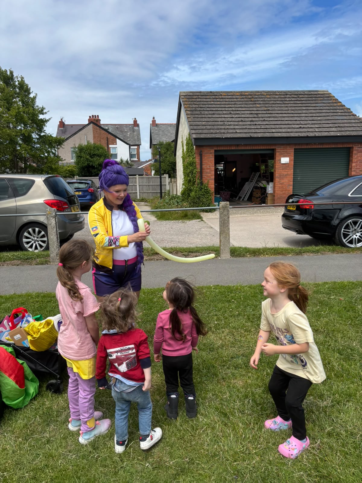 Children enjoying balloon activities at Credu Connecting Carers Fun Day