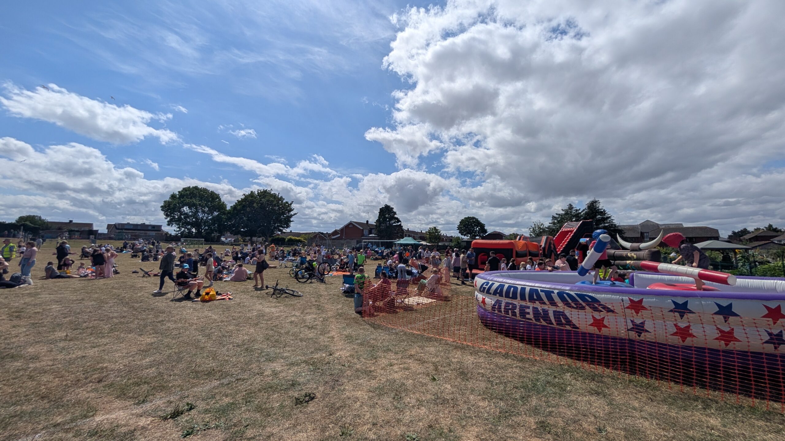 Families enjoying activities at Rhuddlan Volunteer Fair and Picnic in the Park